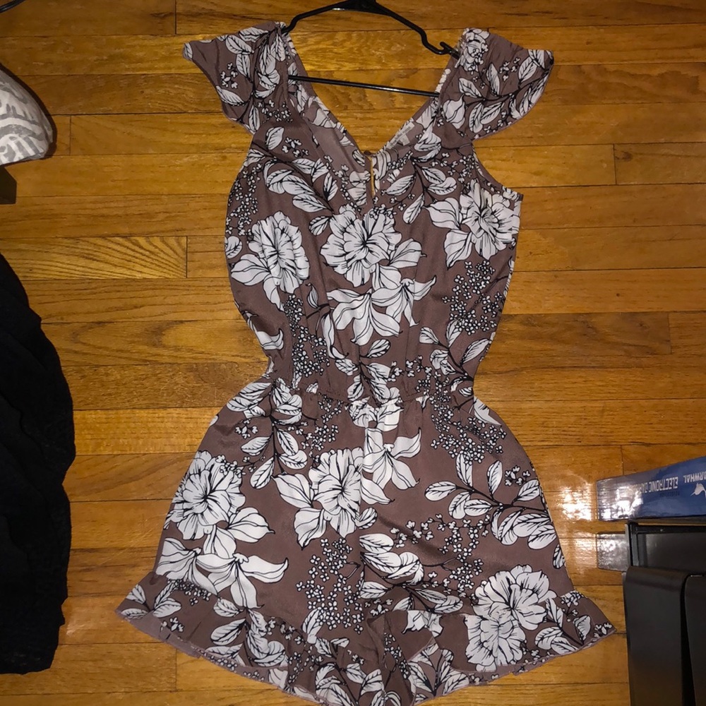 Floral print romper. Like new without tag.